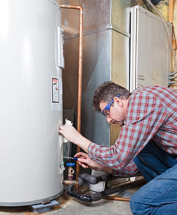 Water heater being repaired